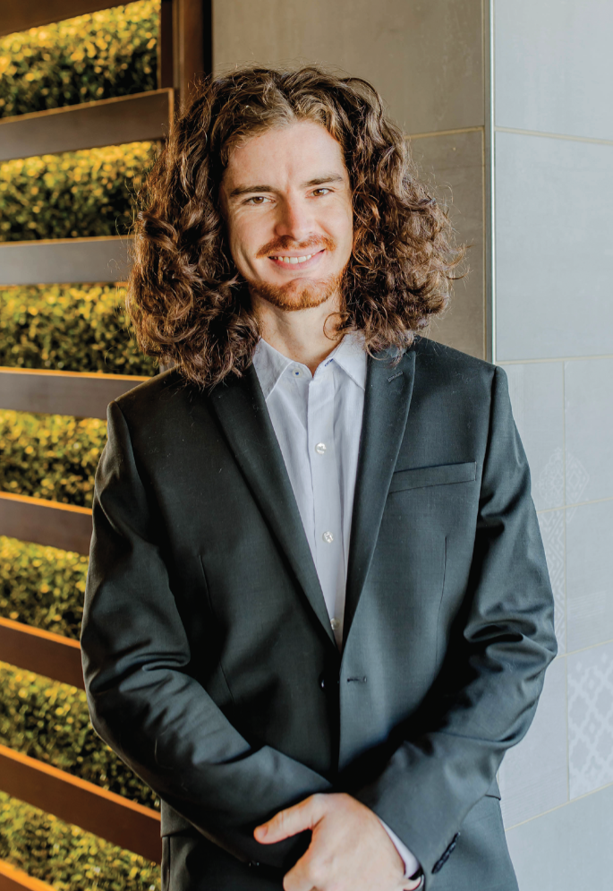 Photo of Taggert Vinzant, one of the Top 10 in 10 Young Professionals to Watch for 2024, photographed by Amy J. Owen.
